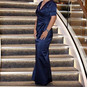 Beautiful navy blue.  Bought this at Newman Marcus.  Wore it one time only.